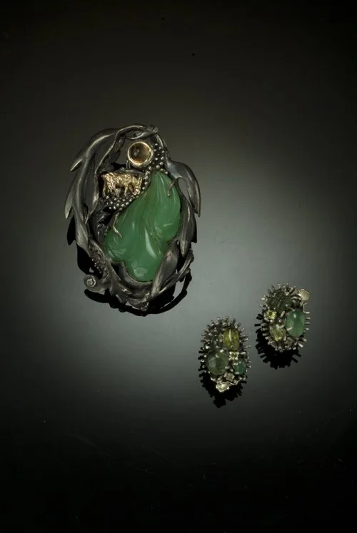 Breadfruit and Goats.jcarved jade, s:s,peridots , 18kt.jpg