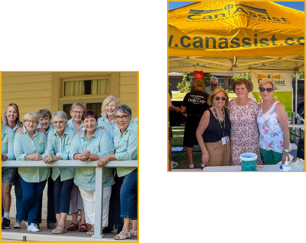 Group of elderly women standing together outdoors, smiling, with a yellow canopy tent promoting Canassist in the background.