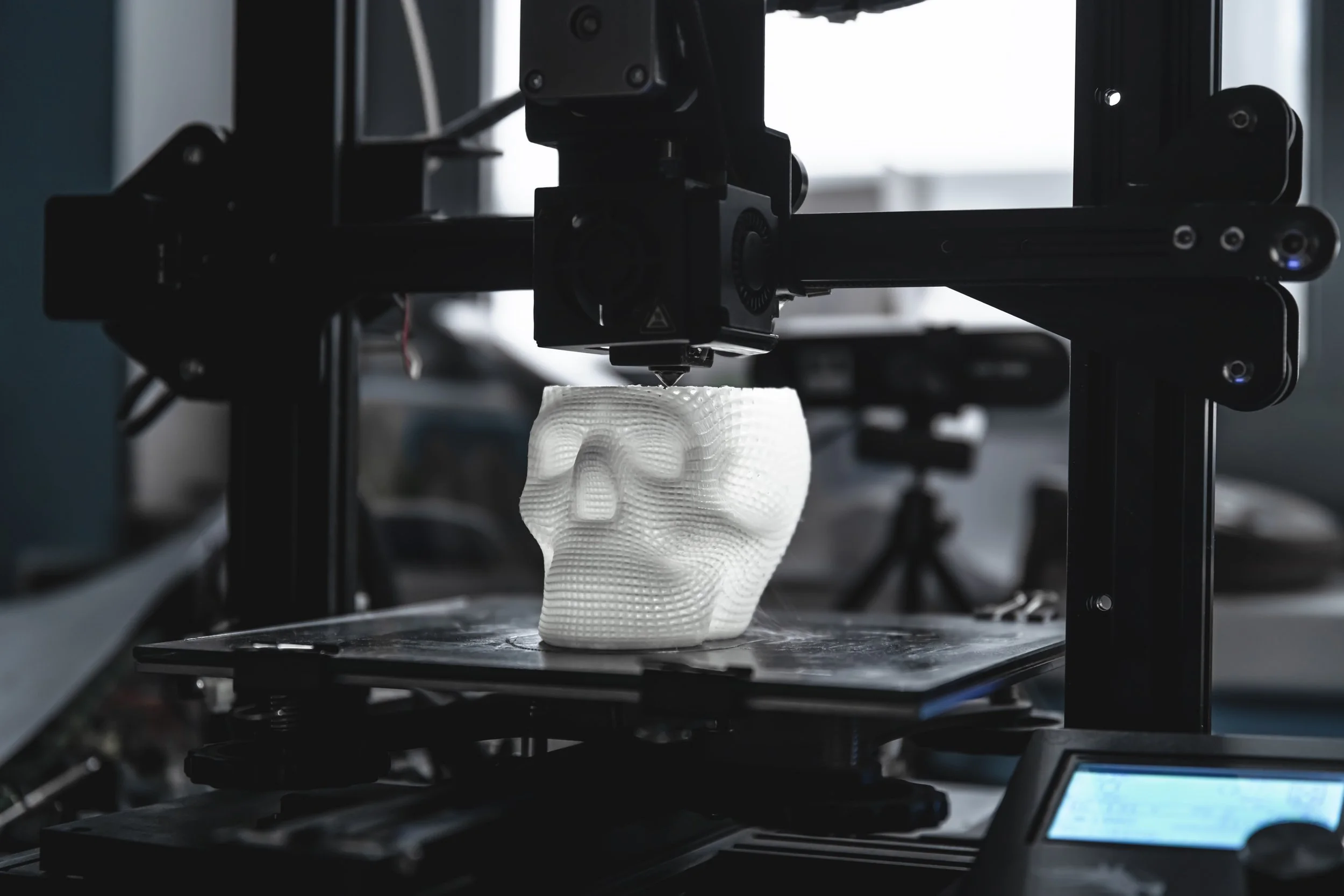 3d-printer-creates-a-white-skull-object-2026-03-19-04-11-48-utc.jpg