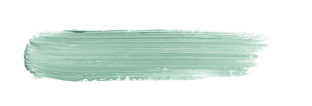 A broad streak of green paint with visible brush strokes on a black background.