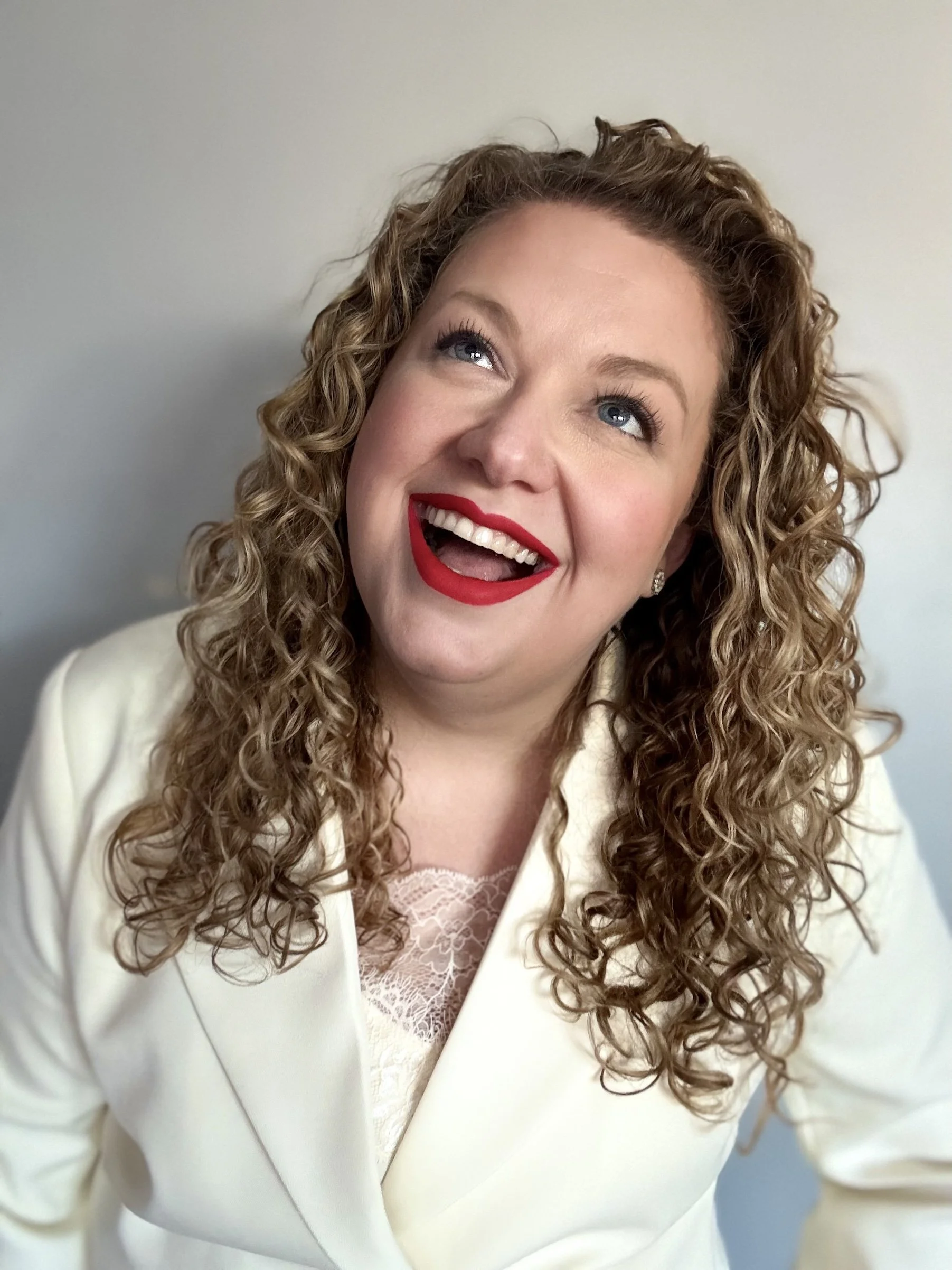 Licensed Psychotherapist Morgan Waggoner, looking relaxed and smiling.
