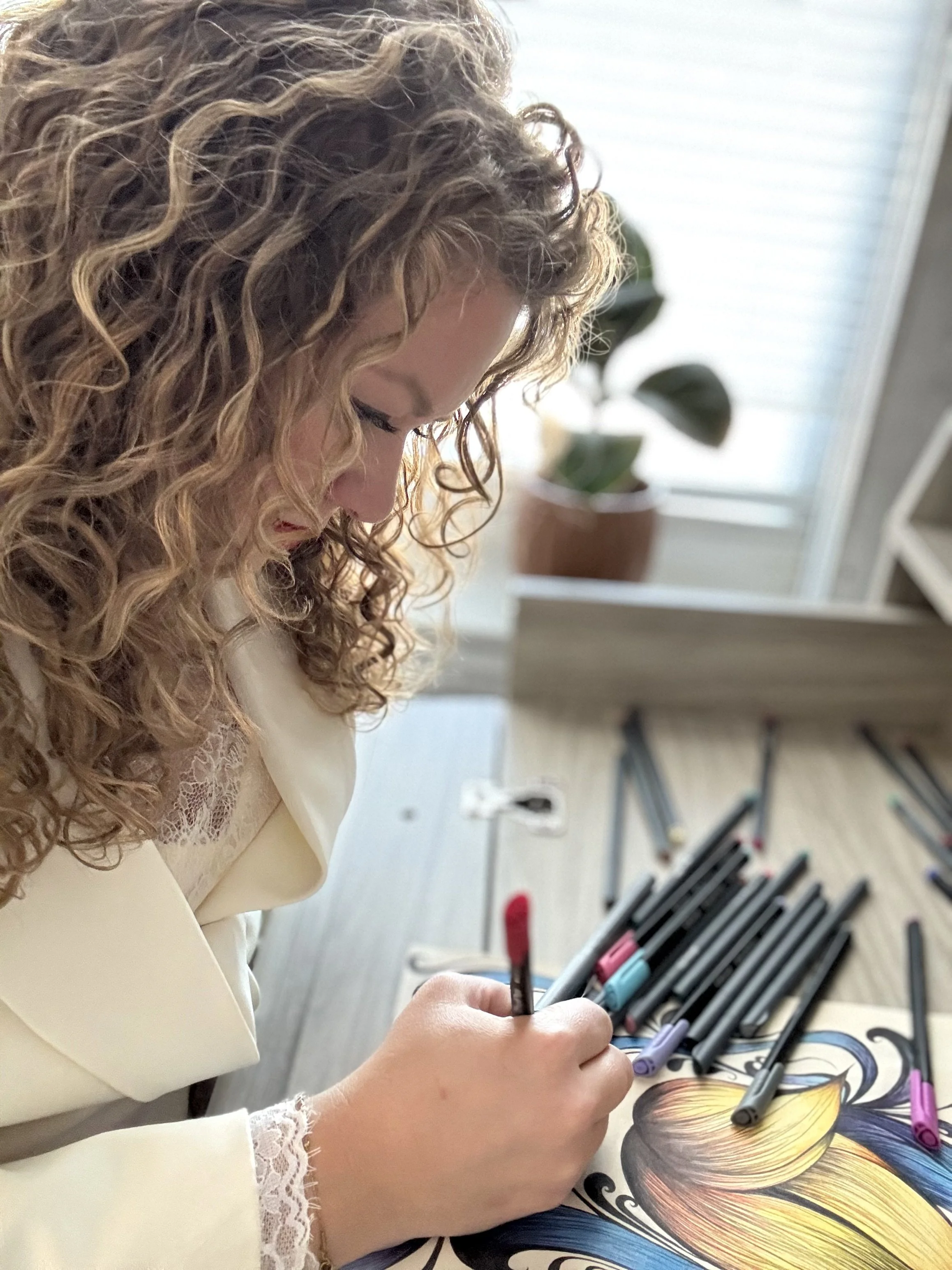 Licensed therapist Morgan Waggoner, engaging in art therapy and mindfulness.