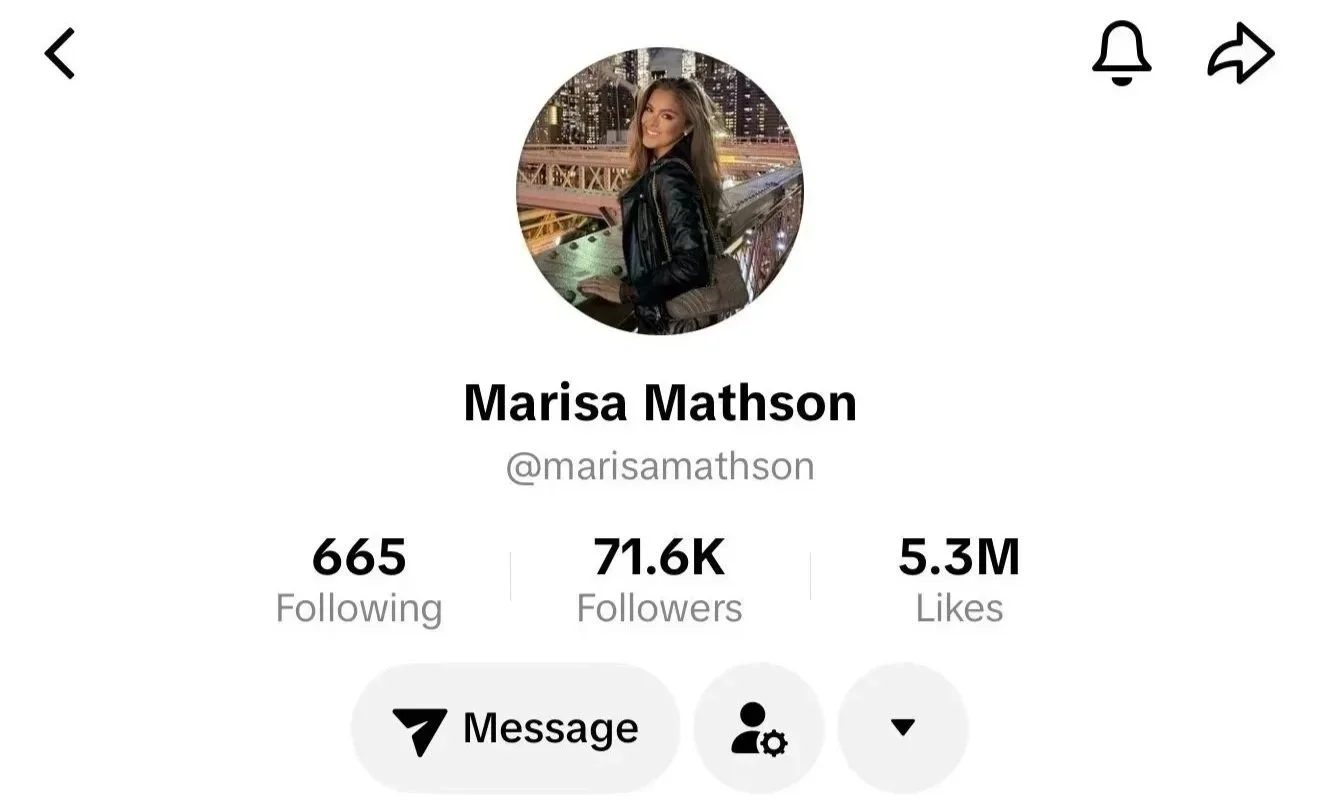 Social media profile page of Marisa Mathson, showing her profile picture, name, username, following count, followers count, and likes, with options to message, access settings, and more.
