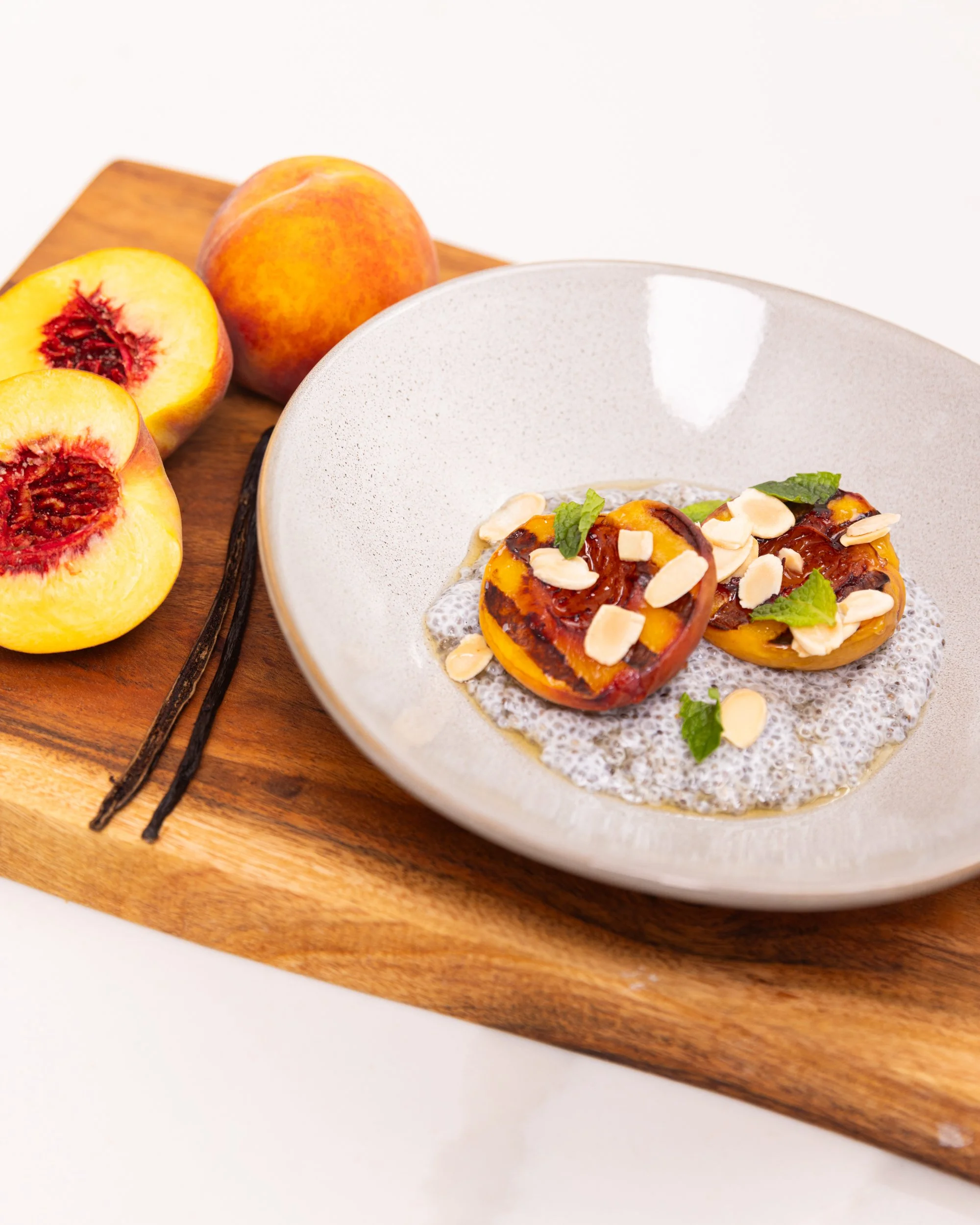 Creamy Chia Pudding with Roasted Peaches & Almonds