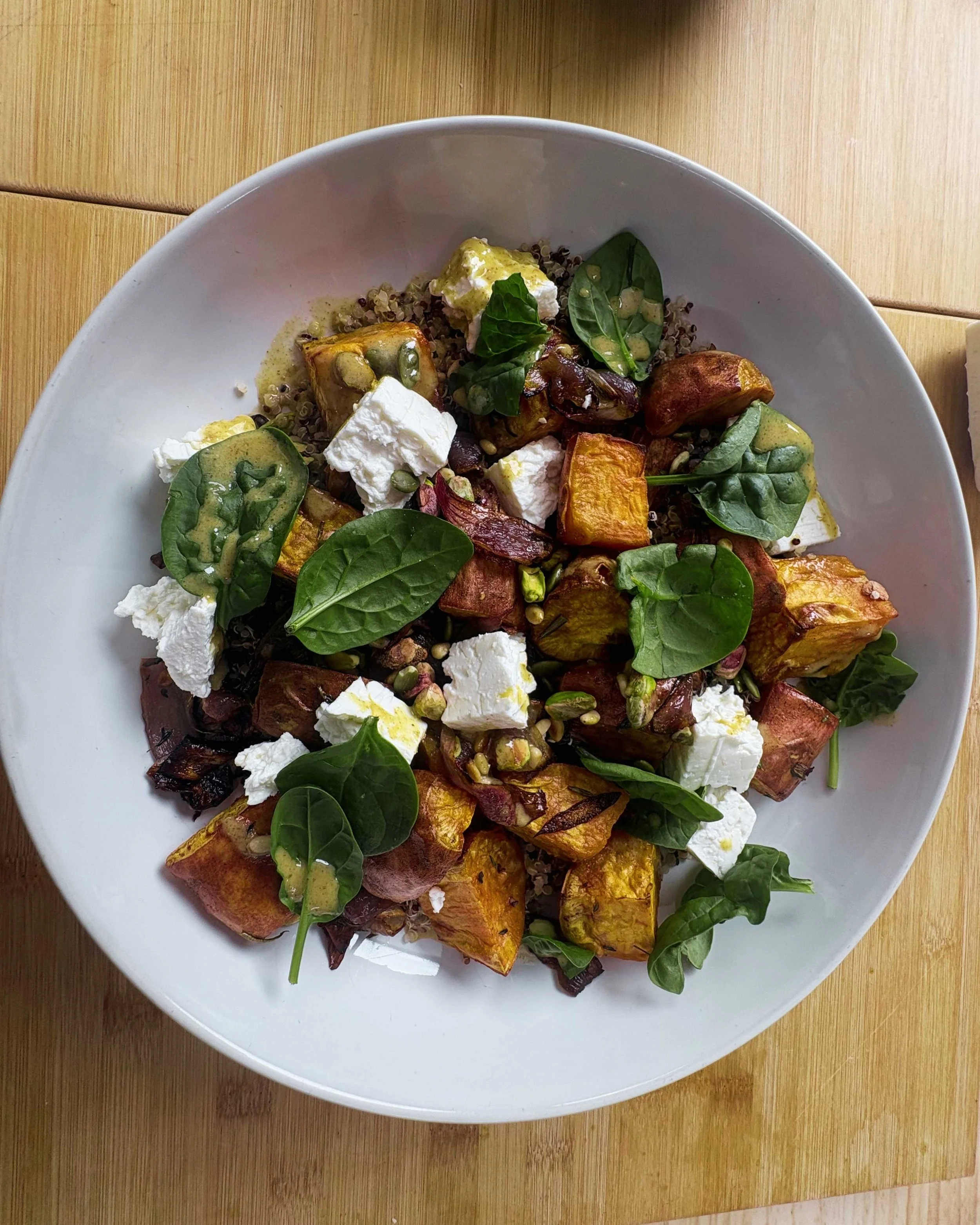 Salad of Fetta, Red Quinoa, Sweet Potato & Onions, nuts with Cumin dressing