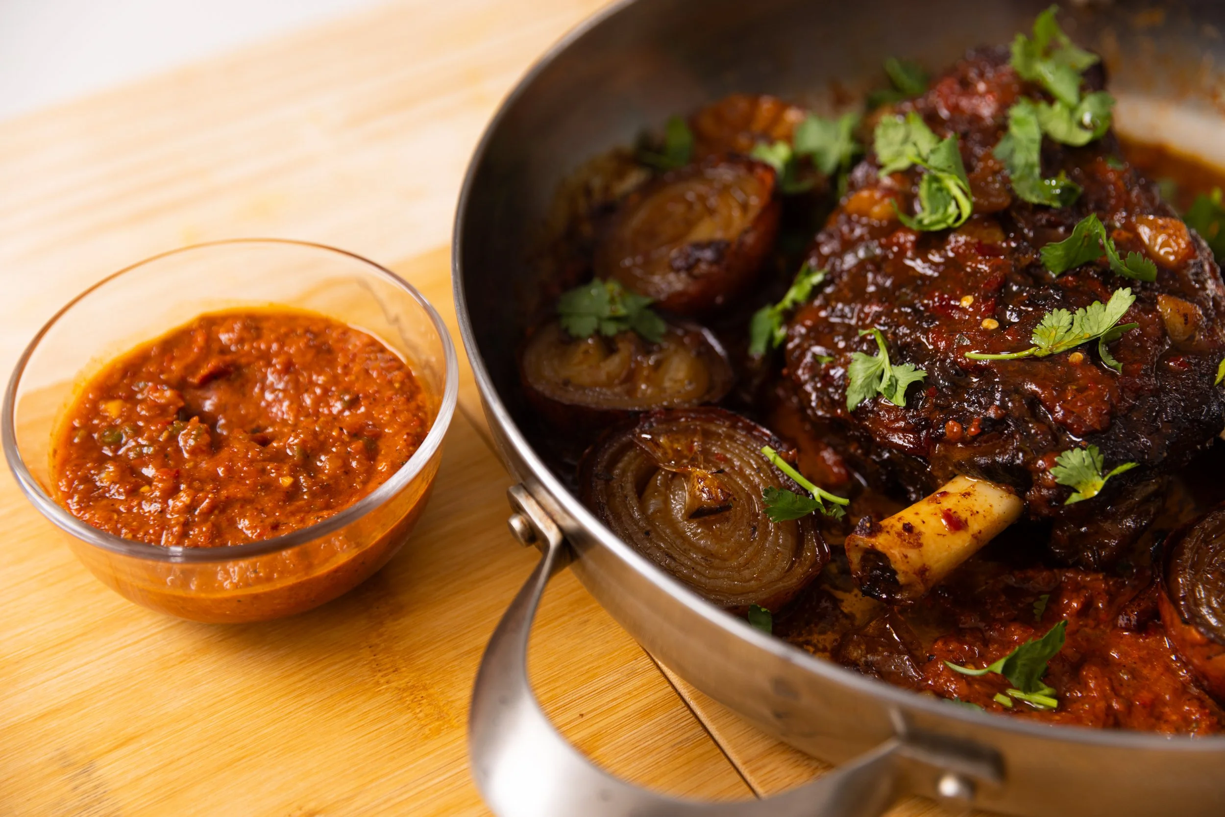 Spicy Slow cooked Lamb Shoulder with Harissa and Hummus