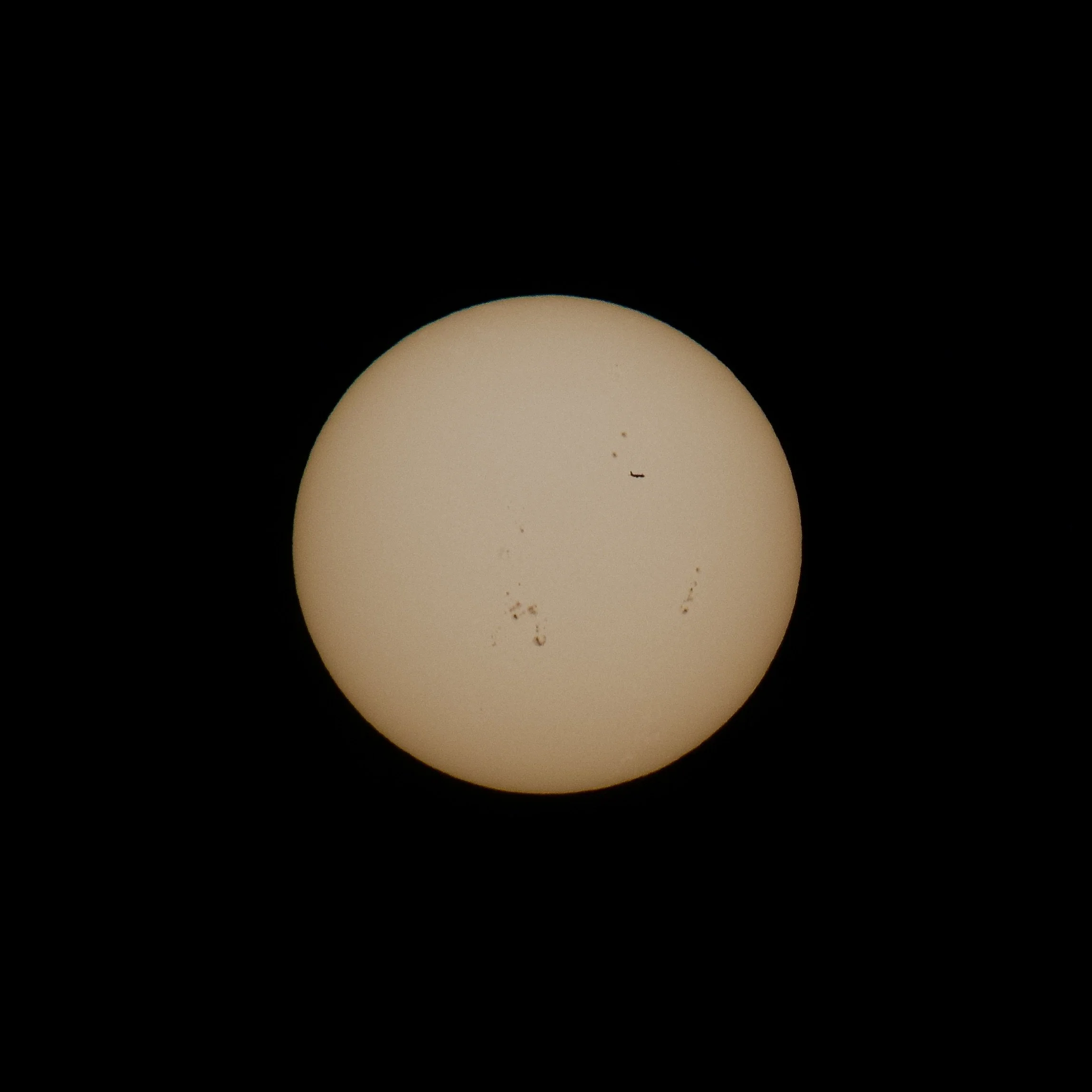 Sunspots with a bonus airliner transit