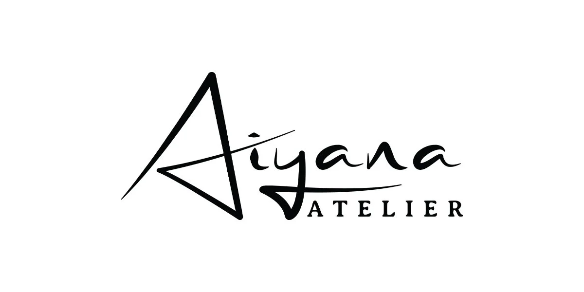Logo for Aiyana Atelier with stylized text and a star design.