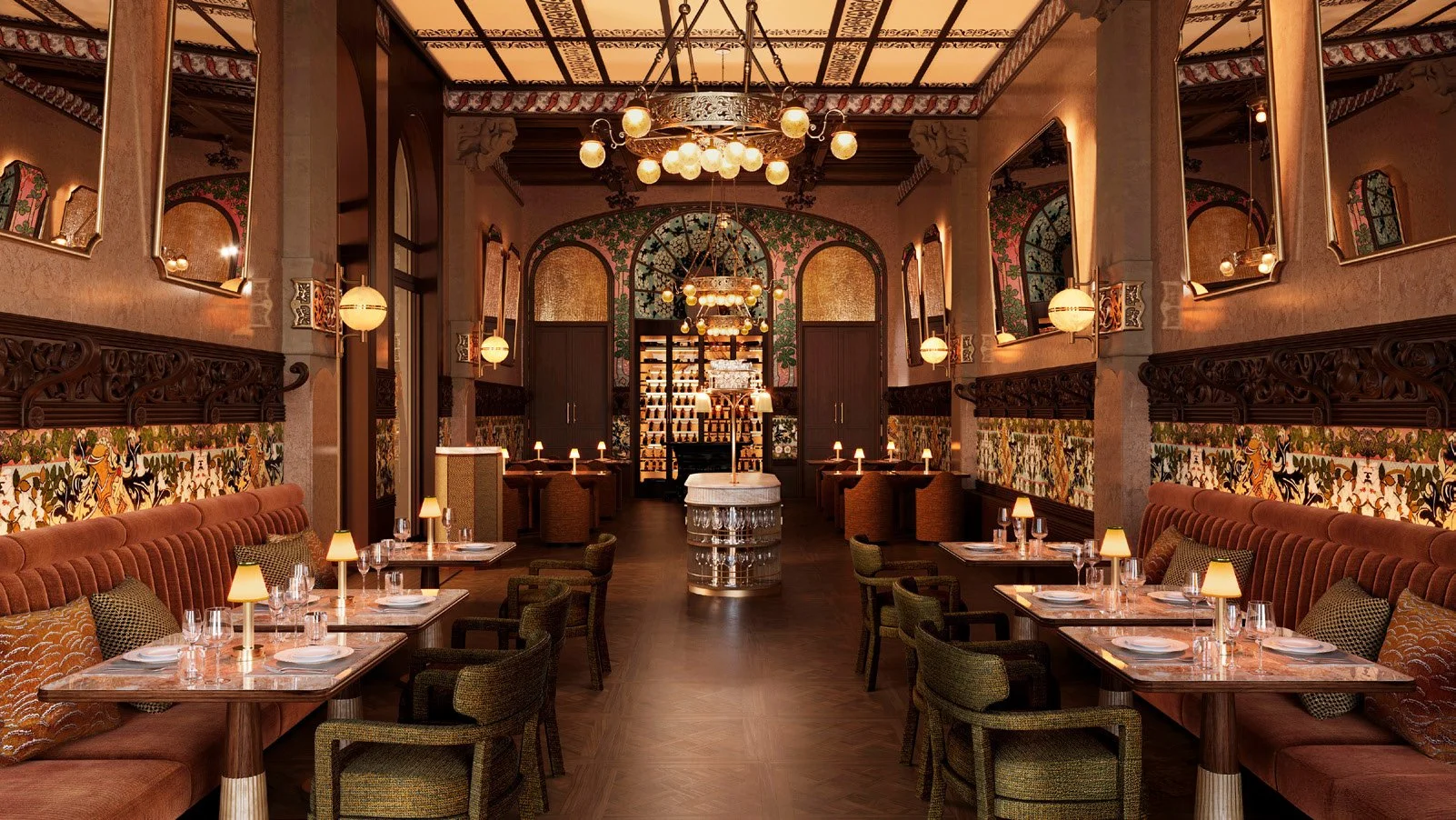 Interior of an elegant restaurant with warm lighting, ornate wall decor, wooden furniture, and a decorative ceiling. Tables are set with glasses, plates, and small lamps, with a wine display at the back.