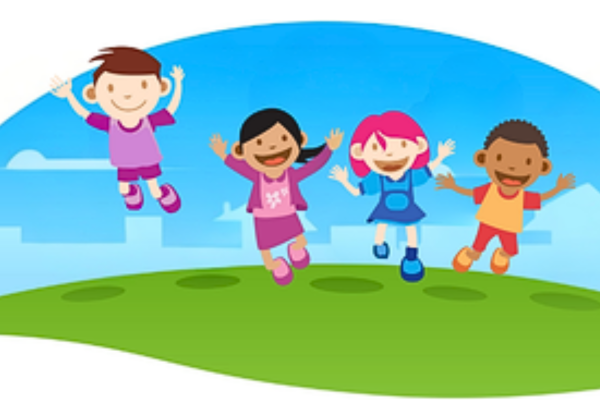 Four children jumping and playing outside on a grassy hill with a blue sky