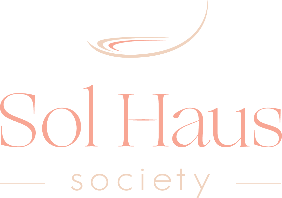 Logo of Sol Haus Society featuring a stylized crescent moon above the words 'Sol Haus' in large pink letters and 'society' below in smaller pink letters on a black background.