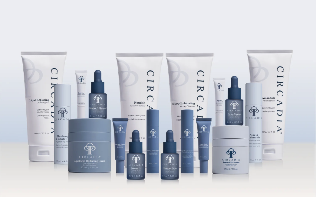 Collection of skincare products with white and blue packaging, including creams, serums, and cleansers, branded Circadia.