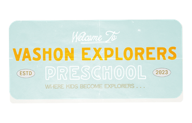The signboard reads "Welcome To Vashon Explorers Preschool" with the tagline "Where Kids Become Explorers" and the year 2023. The design features a light blue background and orange and white text.