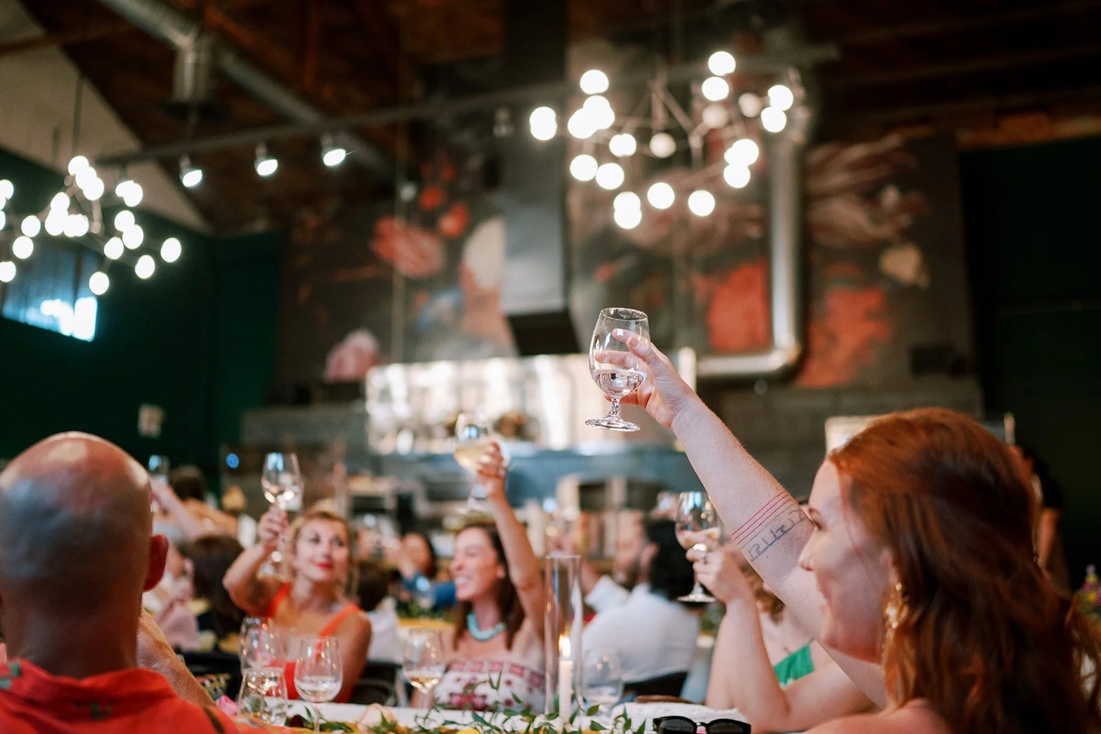 Celebratory dinner gathering at a hospitality venue in Sonoma, California.
