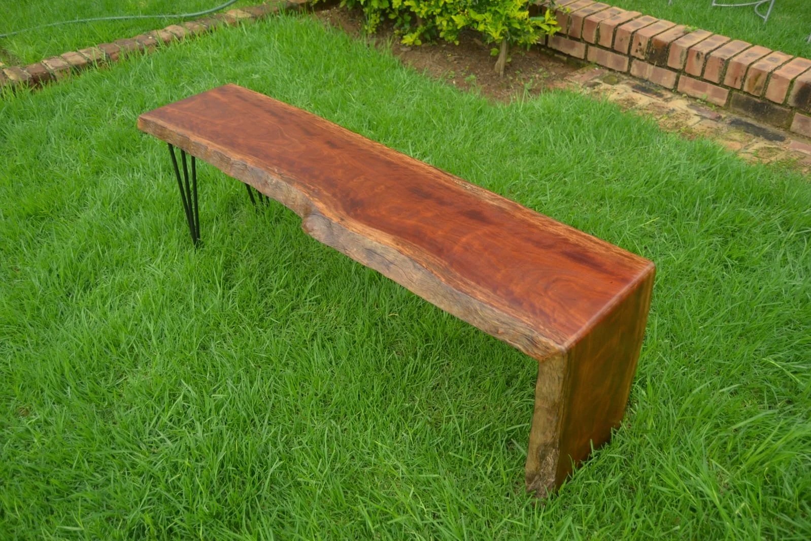 Natural live edge wooden bench with hairpin legs, modern and rustic