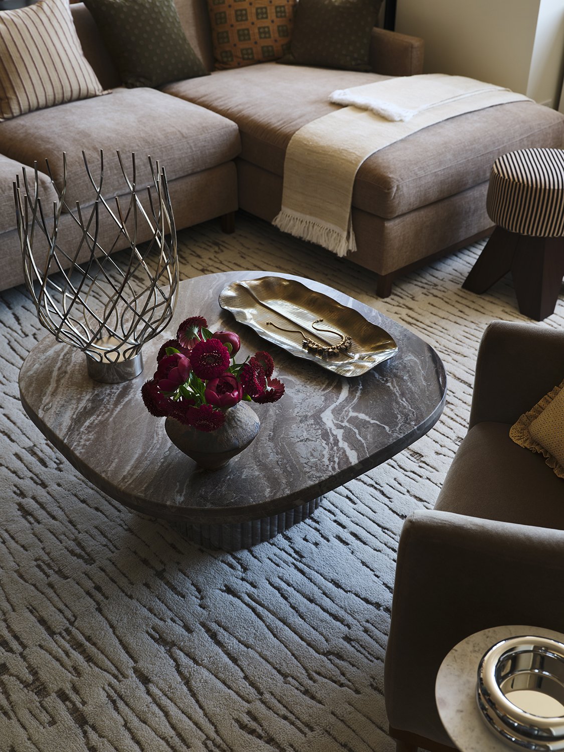 Interior styling detail in a Gramercy Park residence by Vanessa Katzen, coffee table with sculptural objects and refined materials, photographed by Frank Frances.