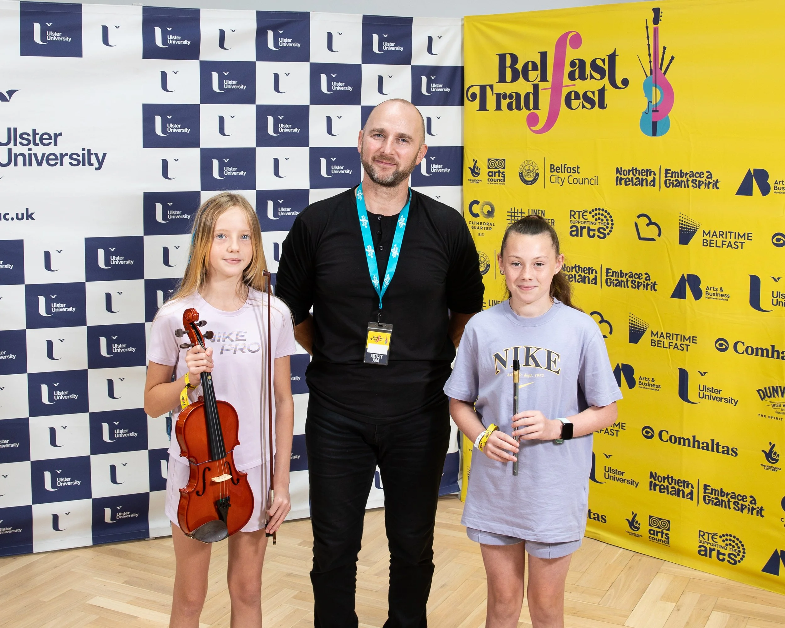 Brendan Mulholland with bursary recipients Aoibhe Murphy & Cara McCullough.jpg