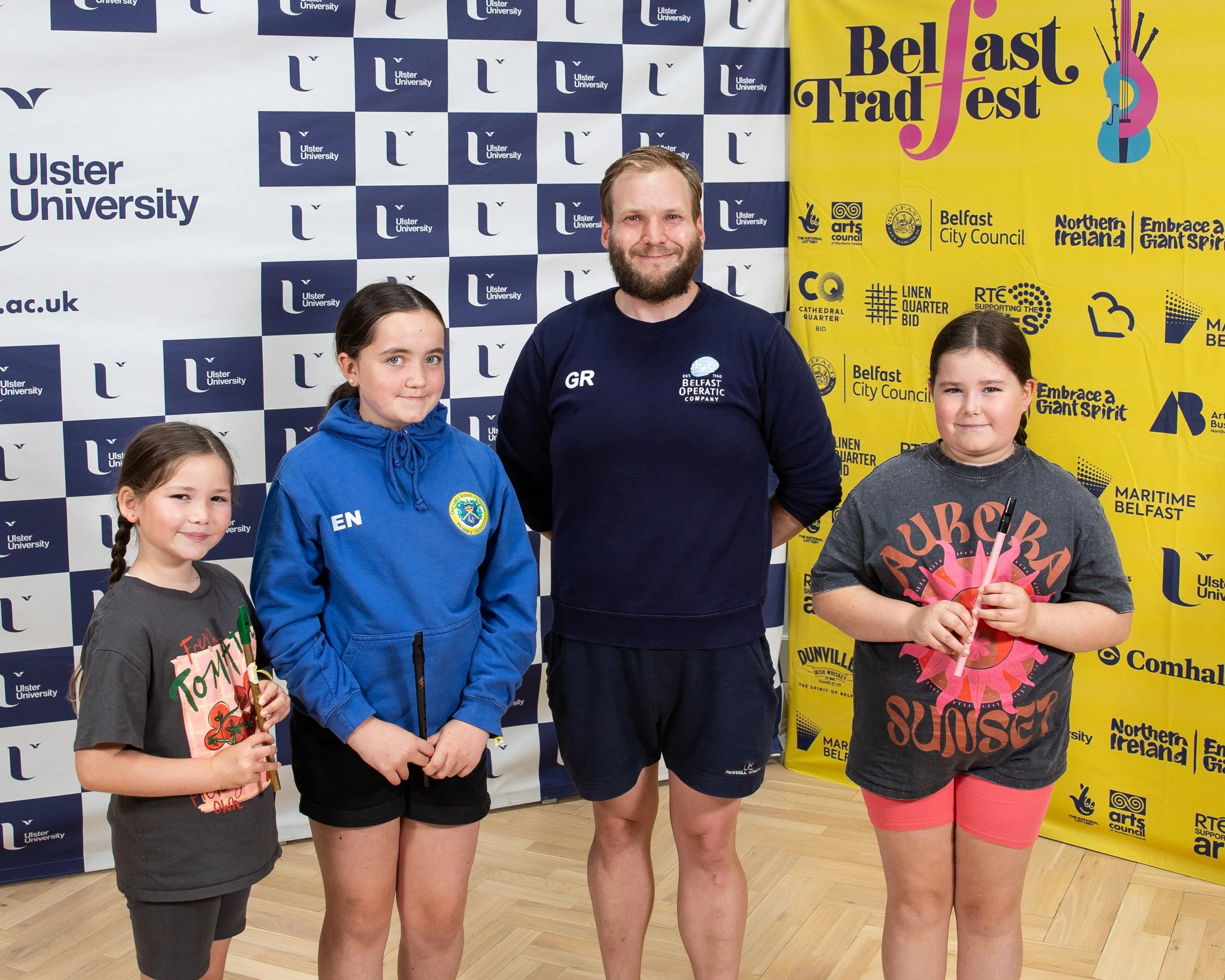 Gary Redpath of Belfast Operatic Company with bursary recipients Niamh Kilifin, Anna Kilifin and Eimear Niblock-1.jpg
