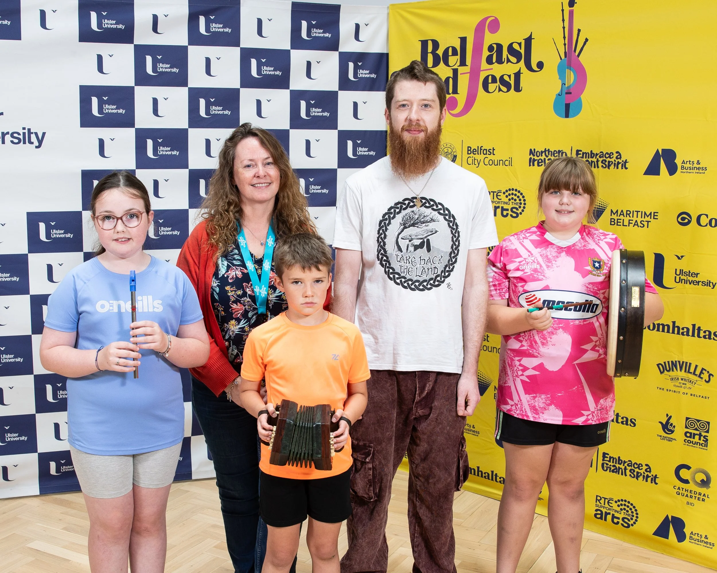 Niamh Ní Charra with bursary recipients Eabha McCann, Cillian McGill, Tiernan Bradshaw and Abigail O'Rawe-1.jpg