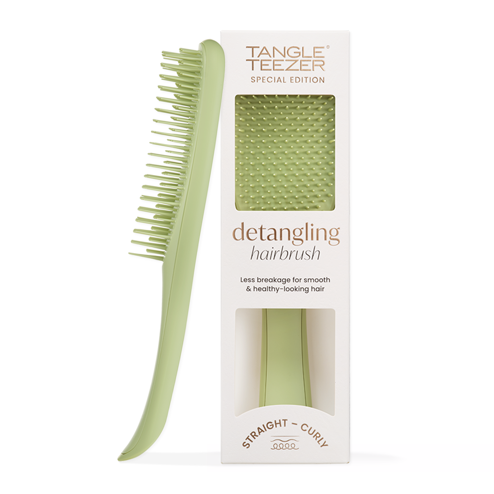 A green hairbrush with a white packaging box that reads "Tangle Teezer Special Edition" and "detangling hairbrush".