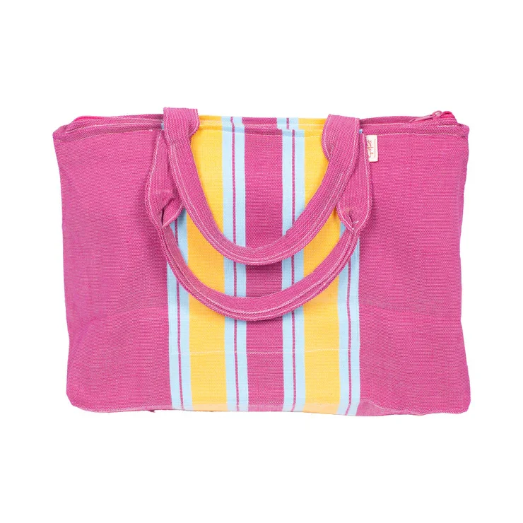Pink fabric tote bag with colorful vertical stripes in blue, yellow, and pink.