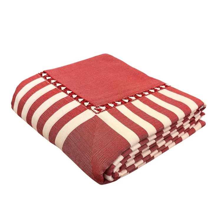 Folded red and white striped kitchen towel