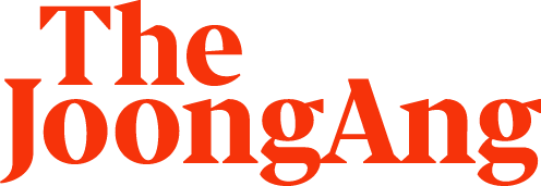 Text that reads "The JoongAng" in bold red font on a black background.