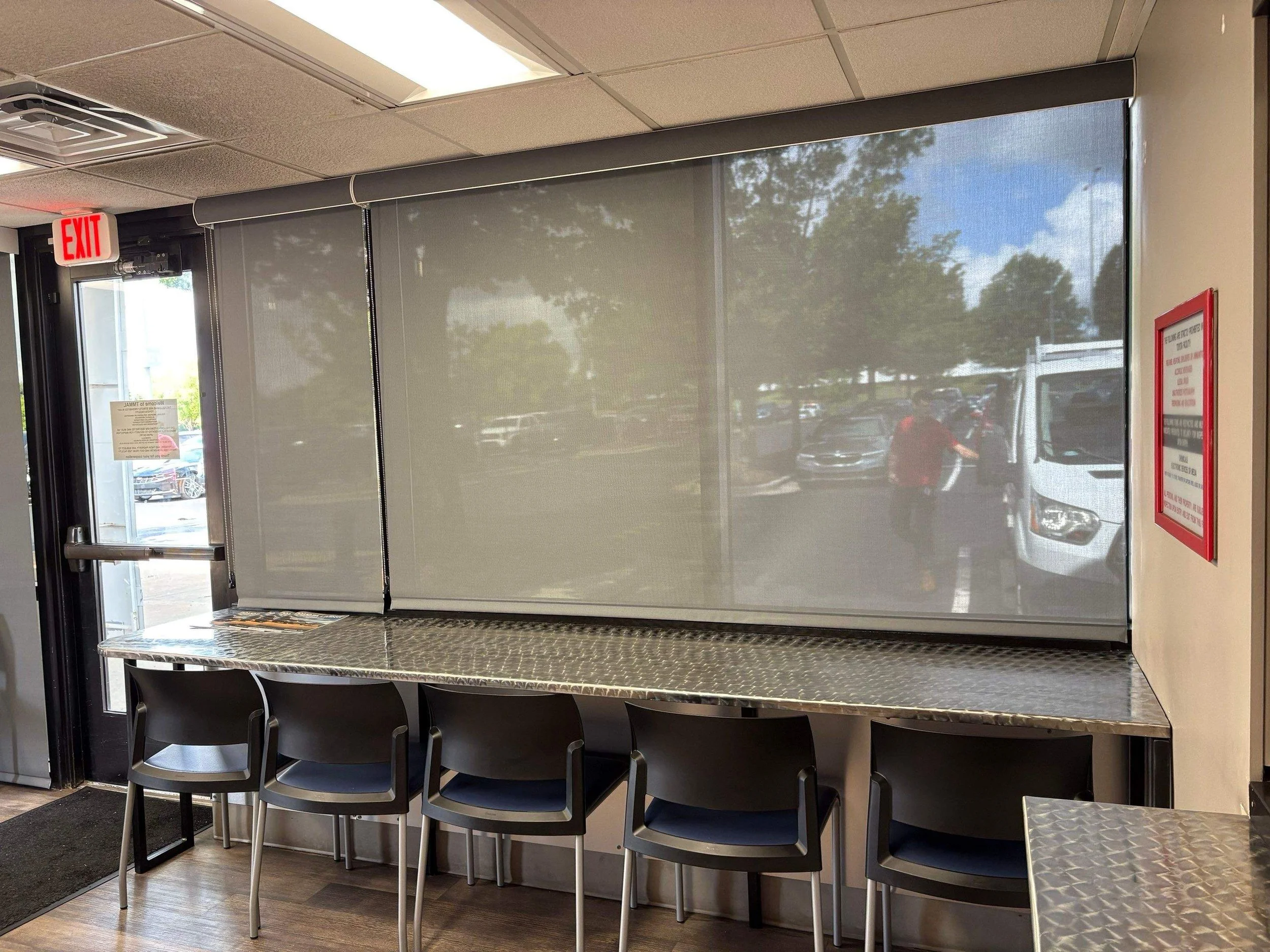 Commercial Solar and Roller Shades: Which One Fits Your Huntsville Office?