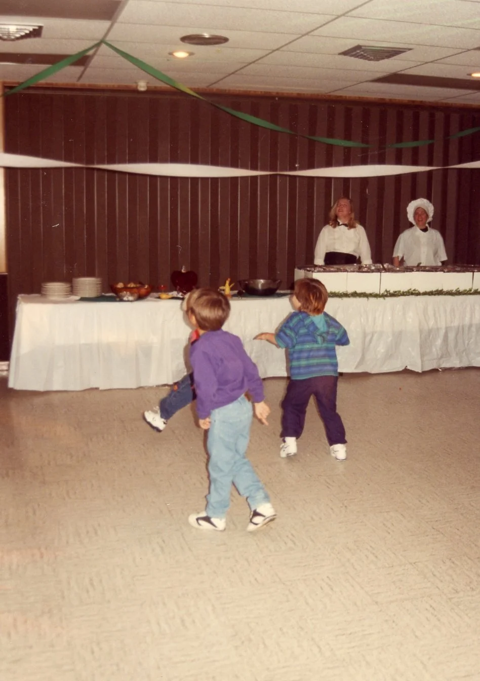 The kids attack the buffet line.