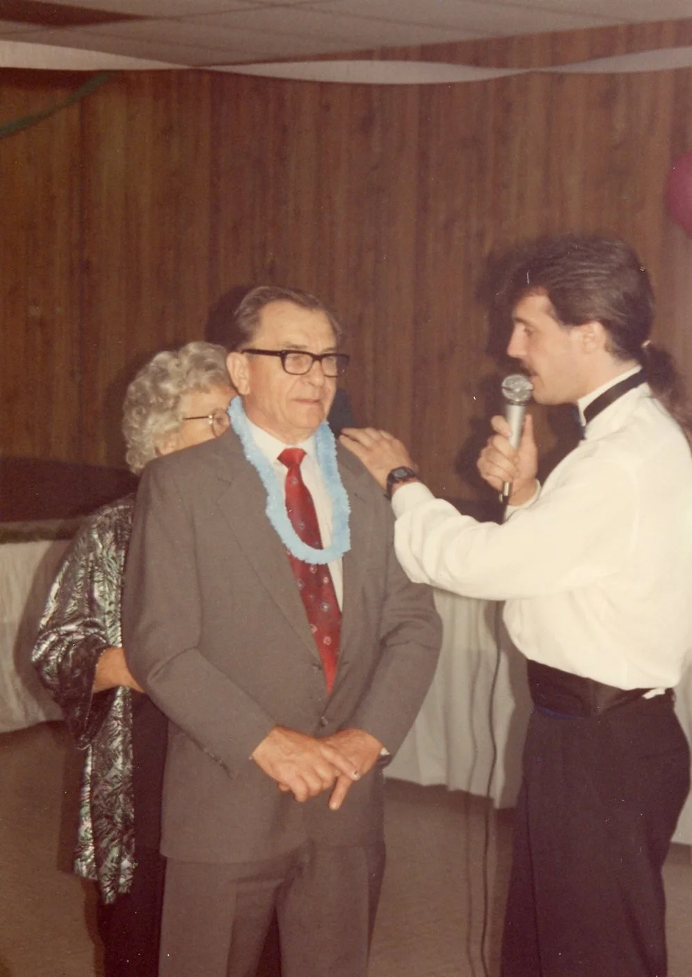 John gets a little coaching from the MC.