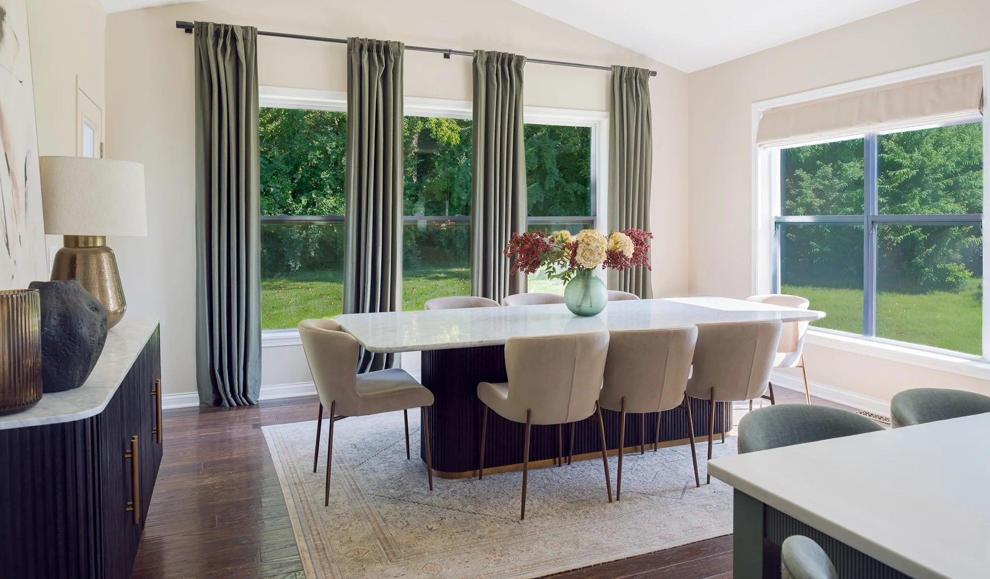 Built-in dining: Built-in dining nook with reeded paneling off the kitchen island in Beavercreek, Ohio