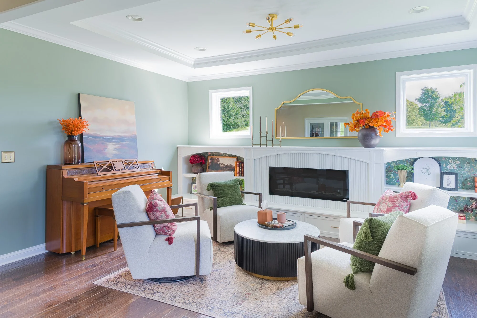Sitting room: Front sitting room with green trim and wallpaper by White Oak Interiors in Dayton, Ohio