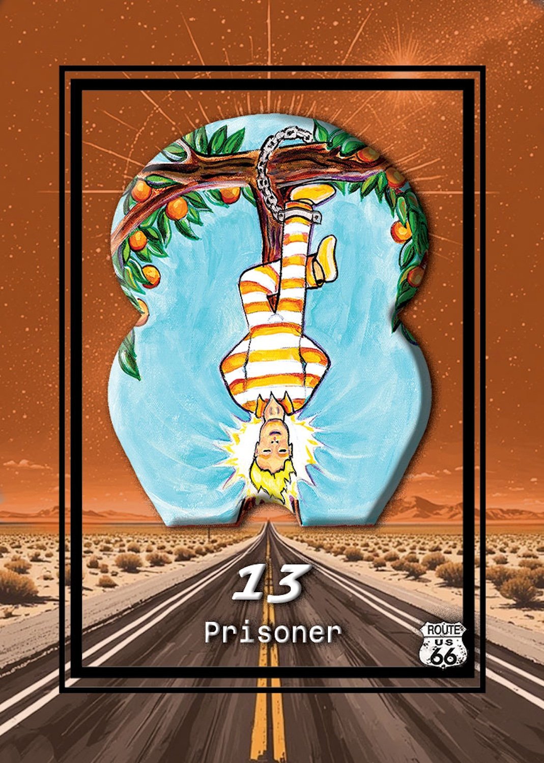 Illustration of a woman with blonde hair in a long striped dress hanging upside down from a tree in a desert landscape, with a road leading to mountains in the background. The card displays the number 13 and the word "Prisoner," with a Route 66 sign.