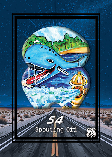 Illustrated badge featuring a blue dinosaur in a water scene with mountains, trees, a fire hydrant, and Route 66 symbol, with the number 54 and the phrase 'Spouting Off'.