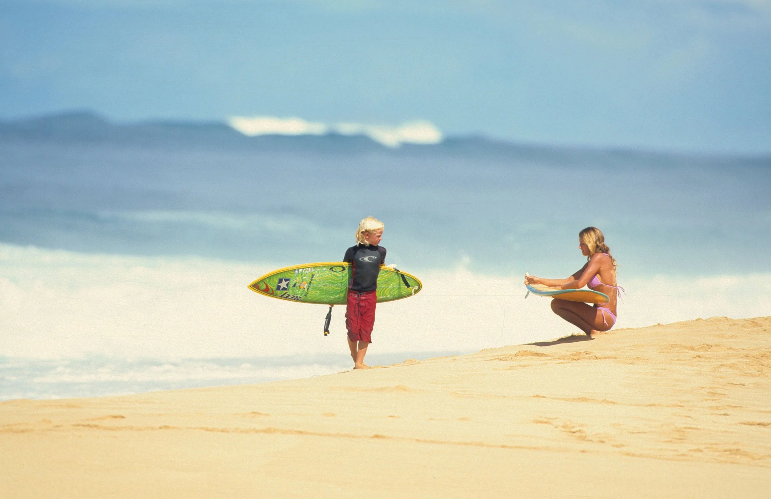 John John Florence and his mom, "Momjohn" Alexandra Florence, at Pipeline, Oahu, Hawaii