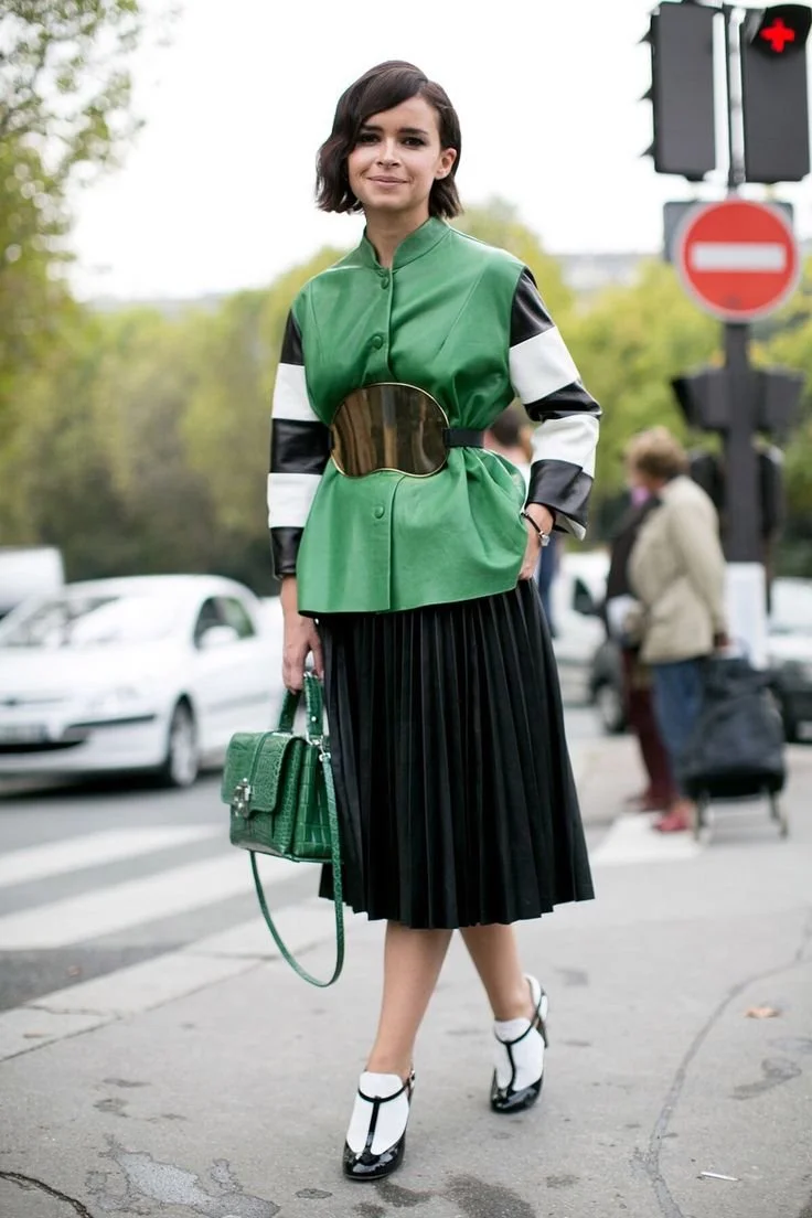 Miroslava Duma in Acne top with Paula Cademartori bag.jpeg