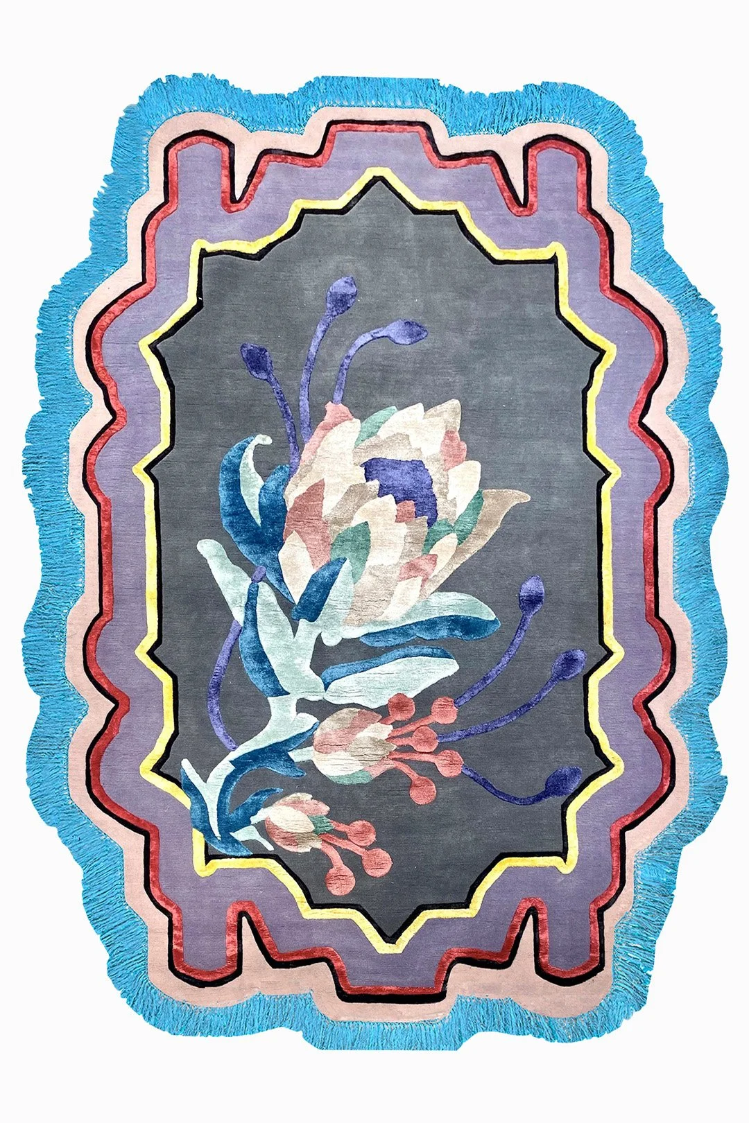 A colorful floral rug with a bouquet of flowers design, surrounded by layered wavy borders in shades of blue, pink, red, black, and yellow.
