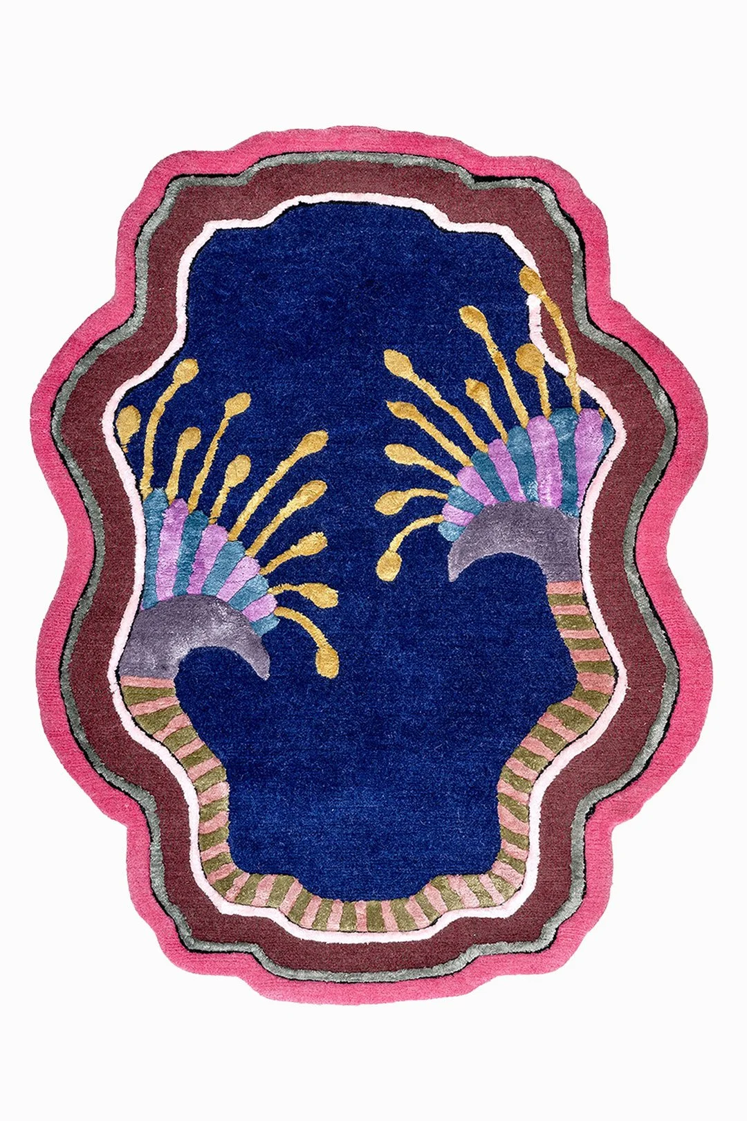 Colorful abstract rug with a dark blue center, pink and brown borders, and symmetrical floral-like yellow and purple designs.