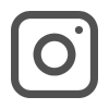 A grayscale icon of a camera with a circular lens in the center.