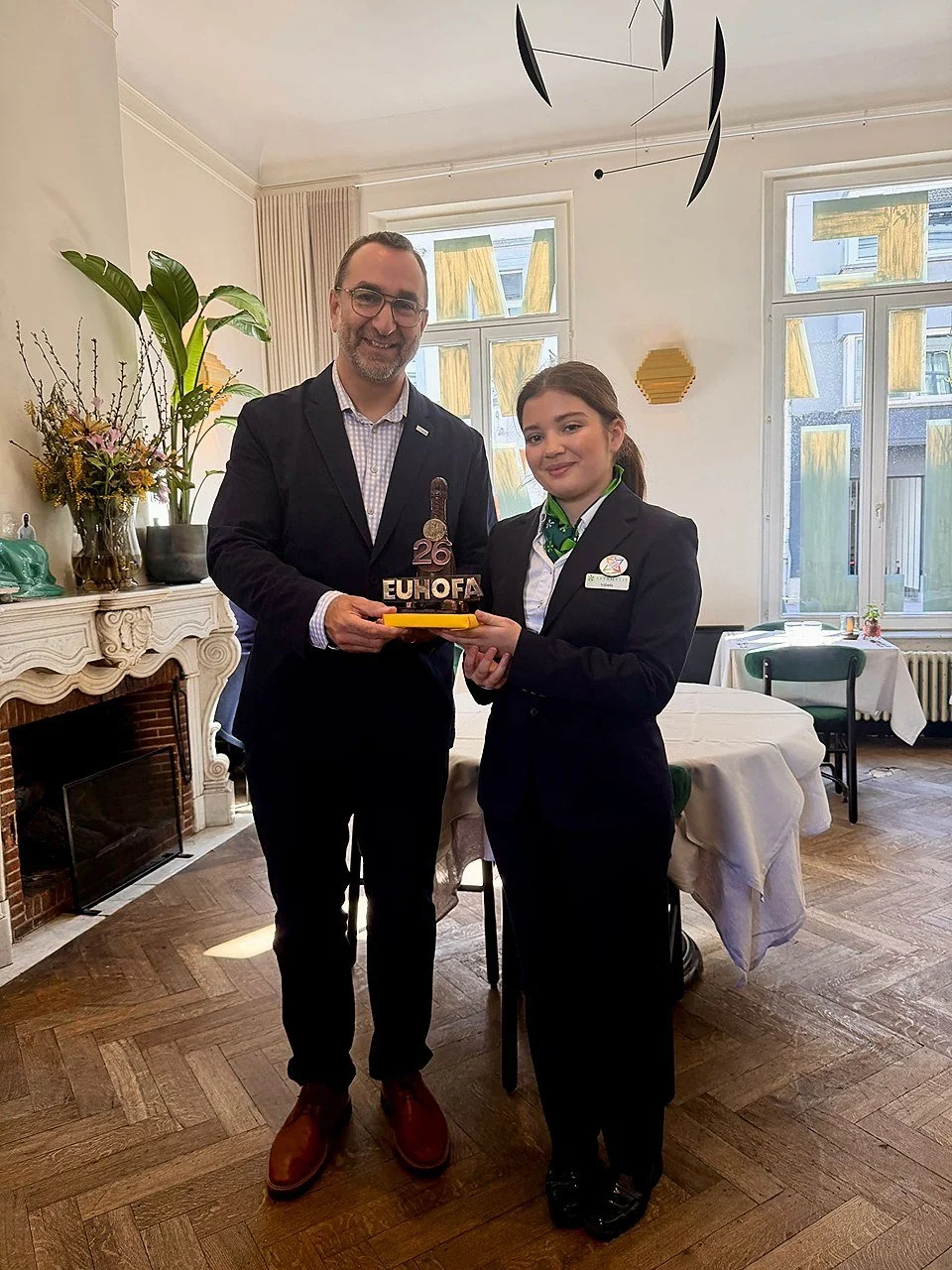 Mr. Lluis Serra, President, EUHOFA International with the student of host school during the Belgium Congress 2026.