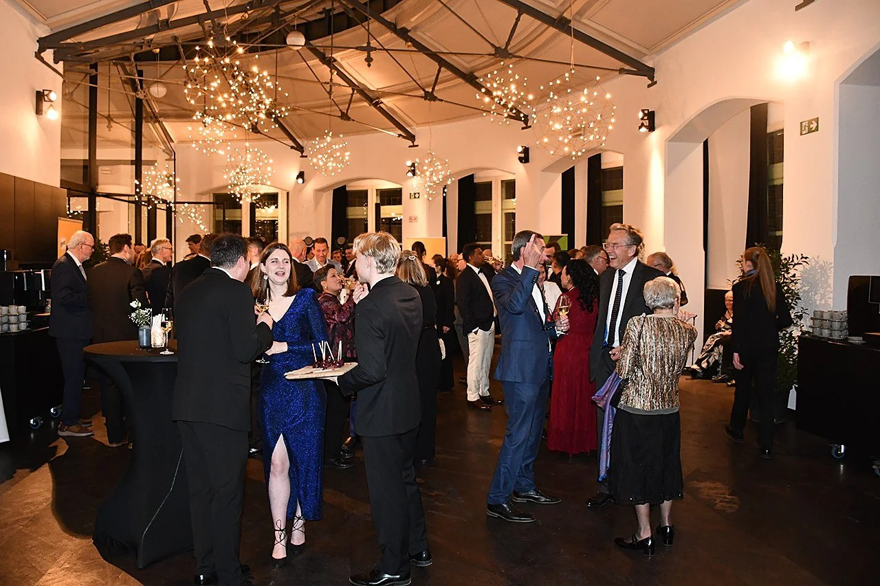 Members socializing at a formal event during EUHOFA Congress.