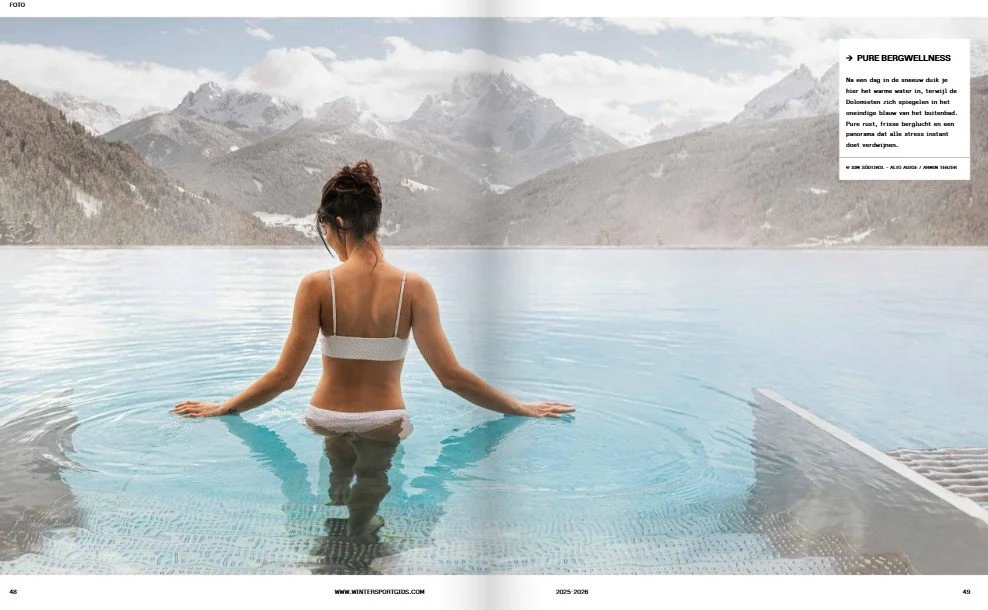 Lady in infinity pool overlooking the mountains