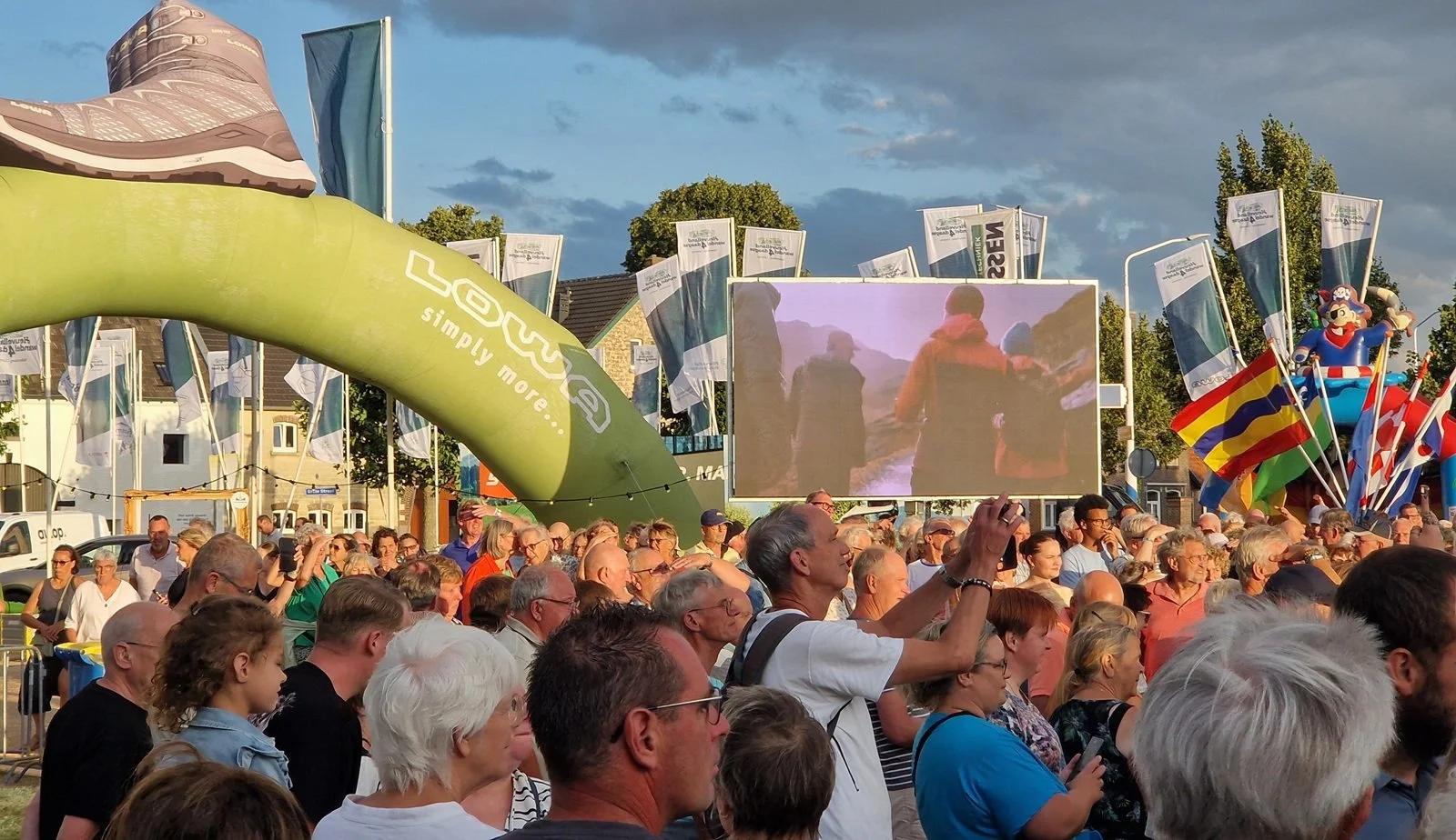 Big video wall showing hike products and hikers enjoying their trip. Positioned ad big hike festival in the Netherlands.