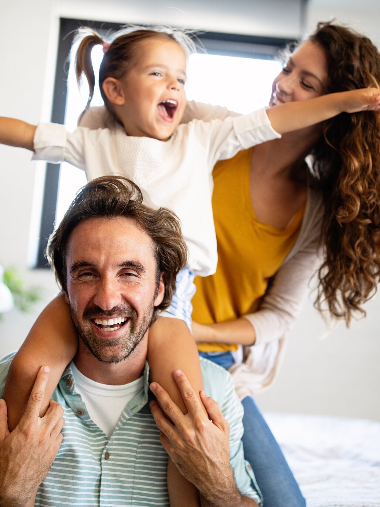 happy-family-having-fun-times-at-home-5T7S93D.jpg
