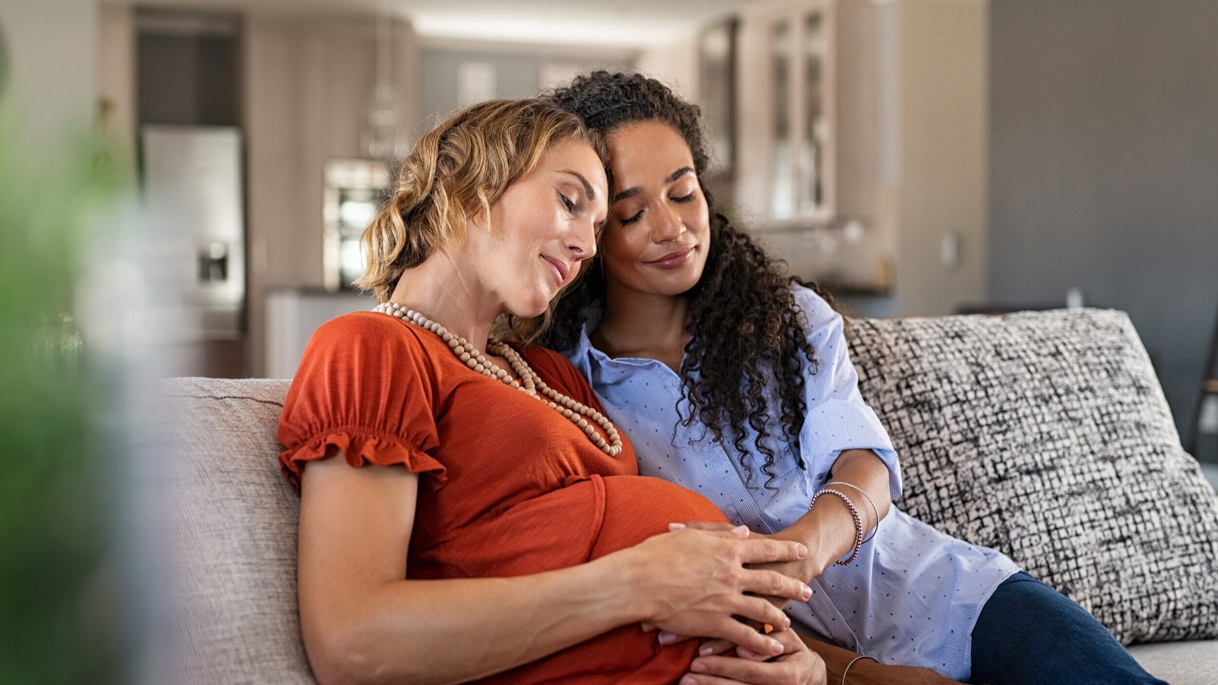 lovely-pregnant-lesbian-couple-at-home-AK6N5KQ.jpg