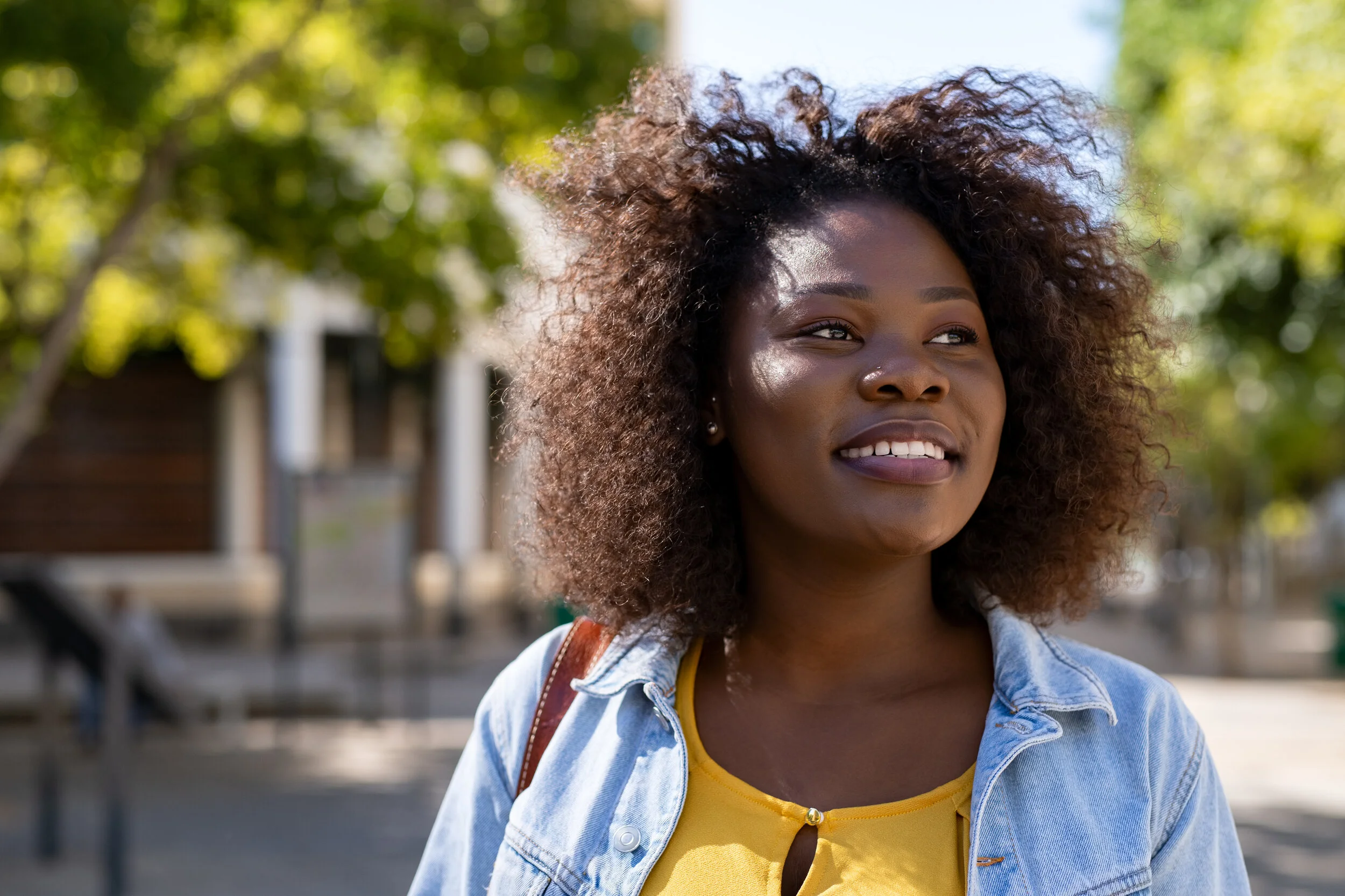 happy-black-woman-thinking-CES3A2U (1).jpg