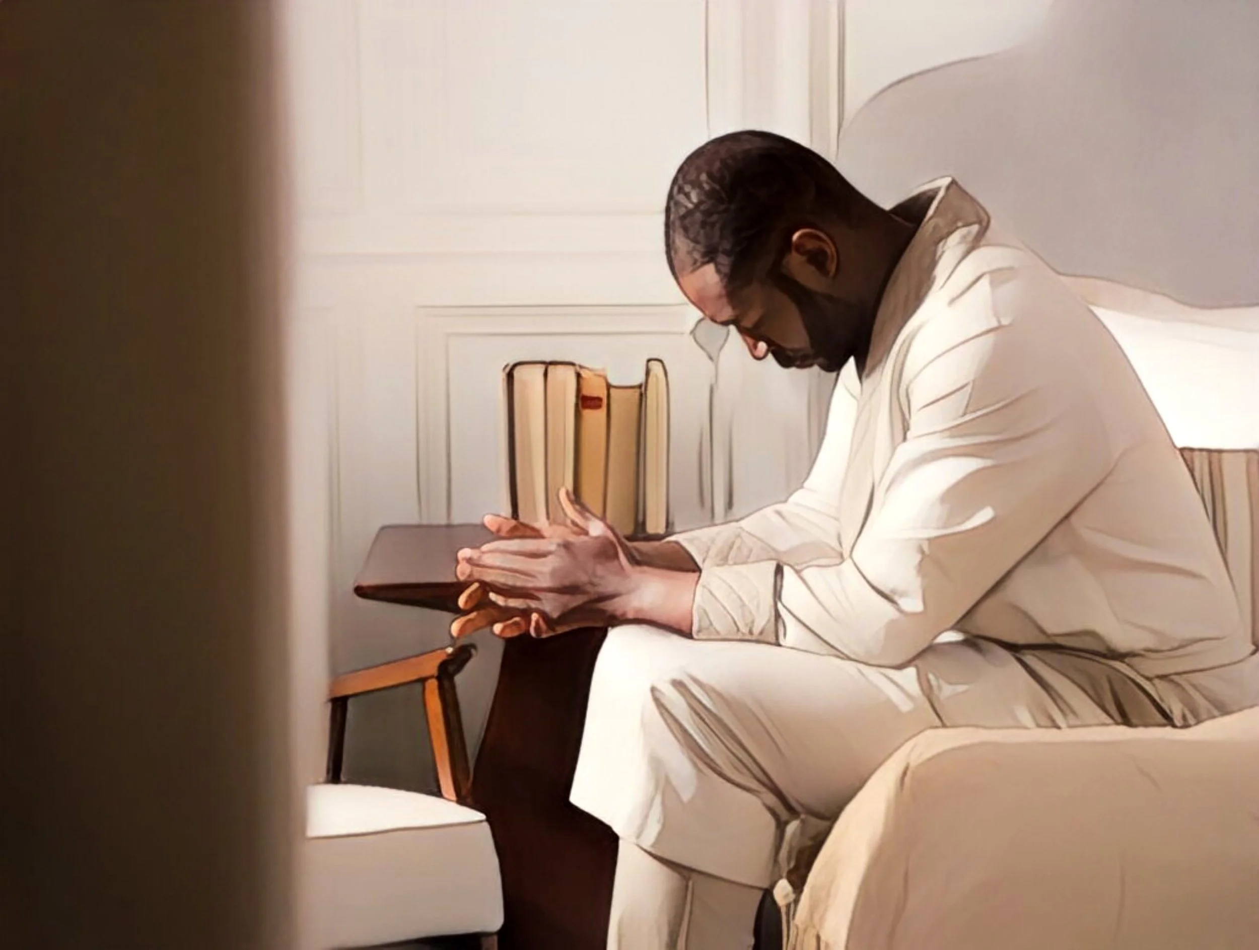 man in white looking down