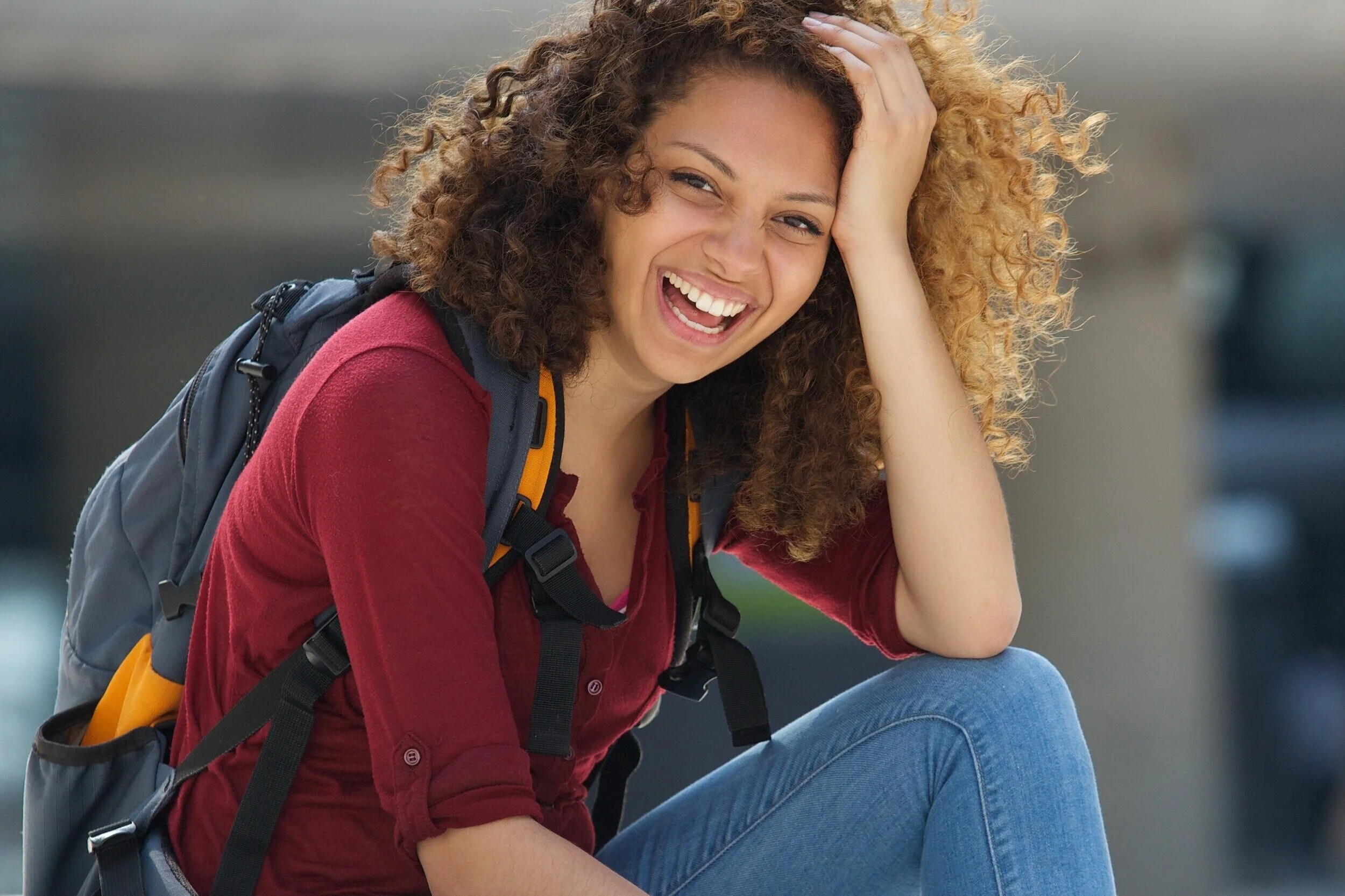 female-college-student-smiling-outdoors-PSDXJ26.jpg