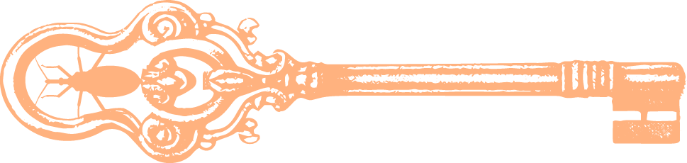 An ornate vintage-style key with intricate decorative details on the head and a long, straight shaft.