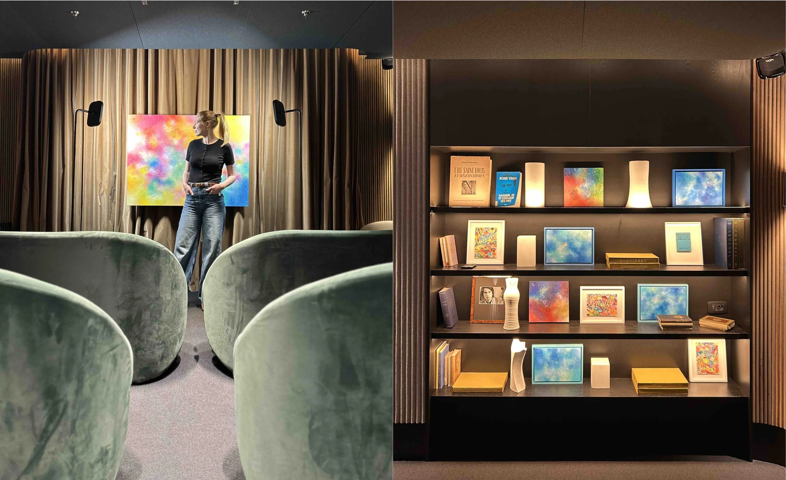 Abstract painting displayed in an interior space with a person, alongside smaller works integrated into a bookshelf